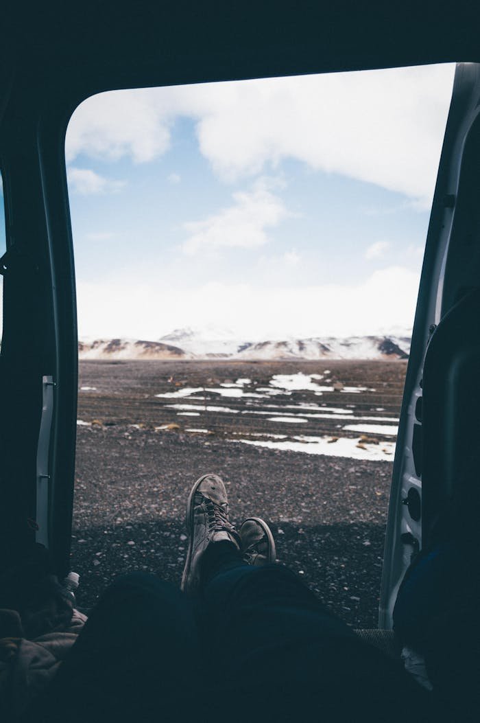 Legs of Person Sitting in RV Door